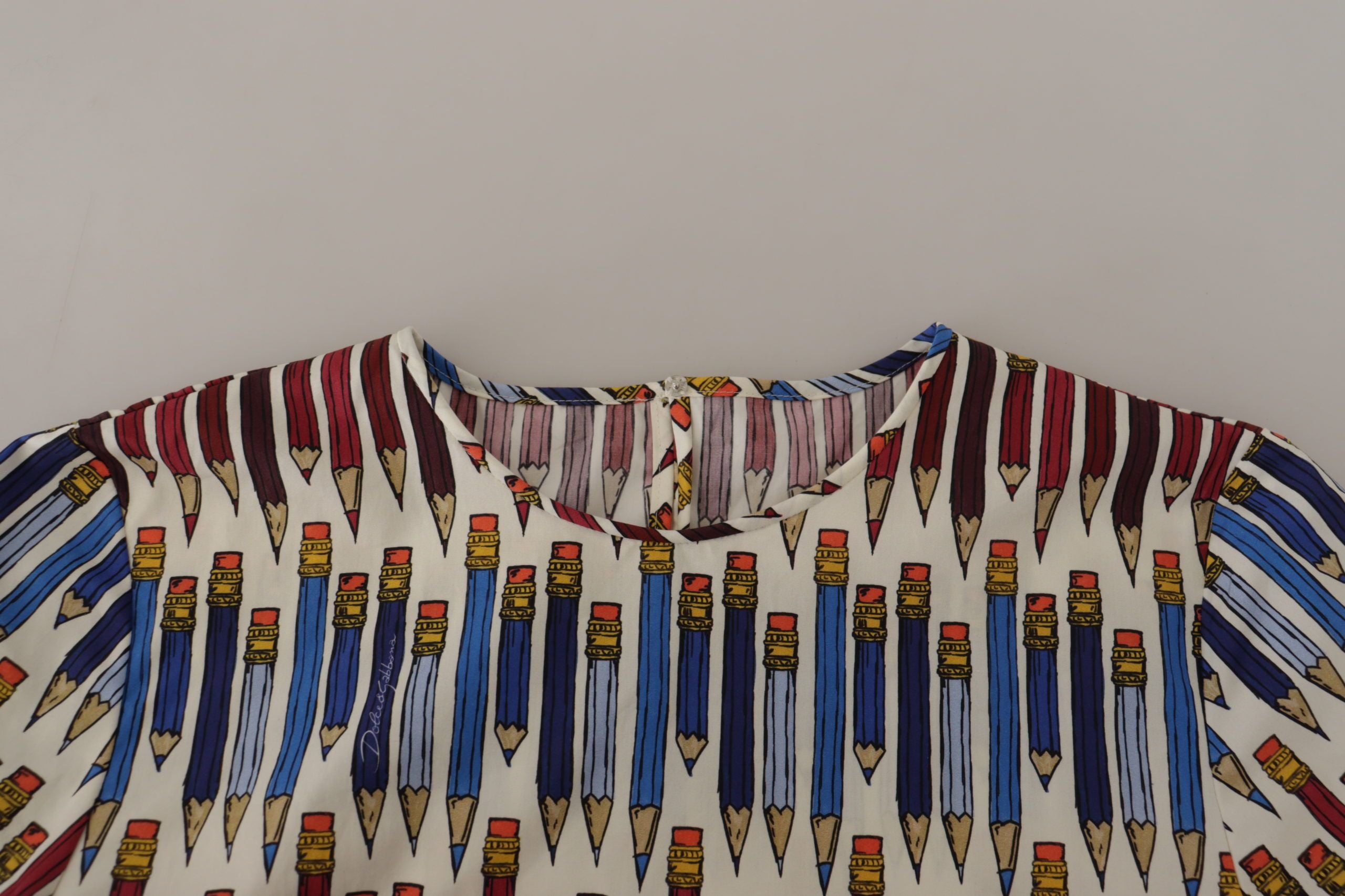 Dolce & Gabbana Weiße T-Shirt-Bluse mit Bleistiftdruck aus Baumwolle