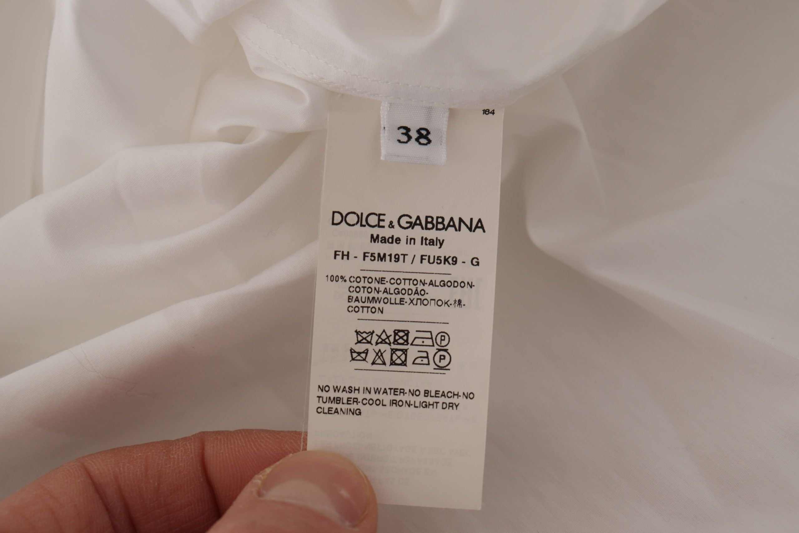 Dolce &amp; Gabbana white sleeveless tuxedo blouse top for formal occasions