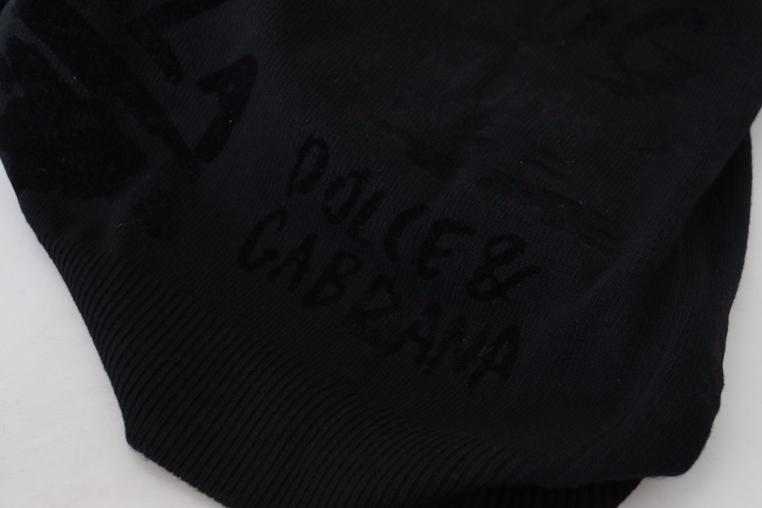 Dolce & Gabbana Schwarzer Wollpullover mit Logo-Muster und Rundhalsausschnitt
