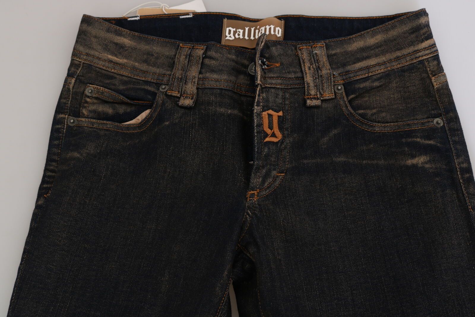 John Galliano Schwarze gewaschene Denim-Hose mit ausgestelltem Bund aus Baumwolle