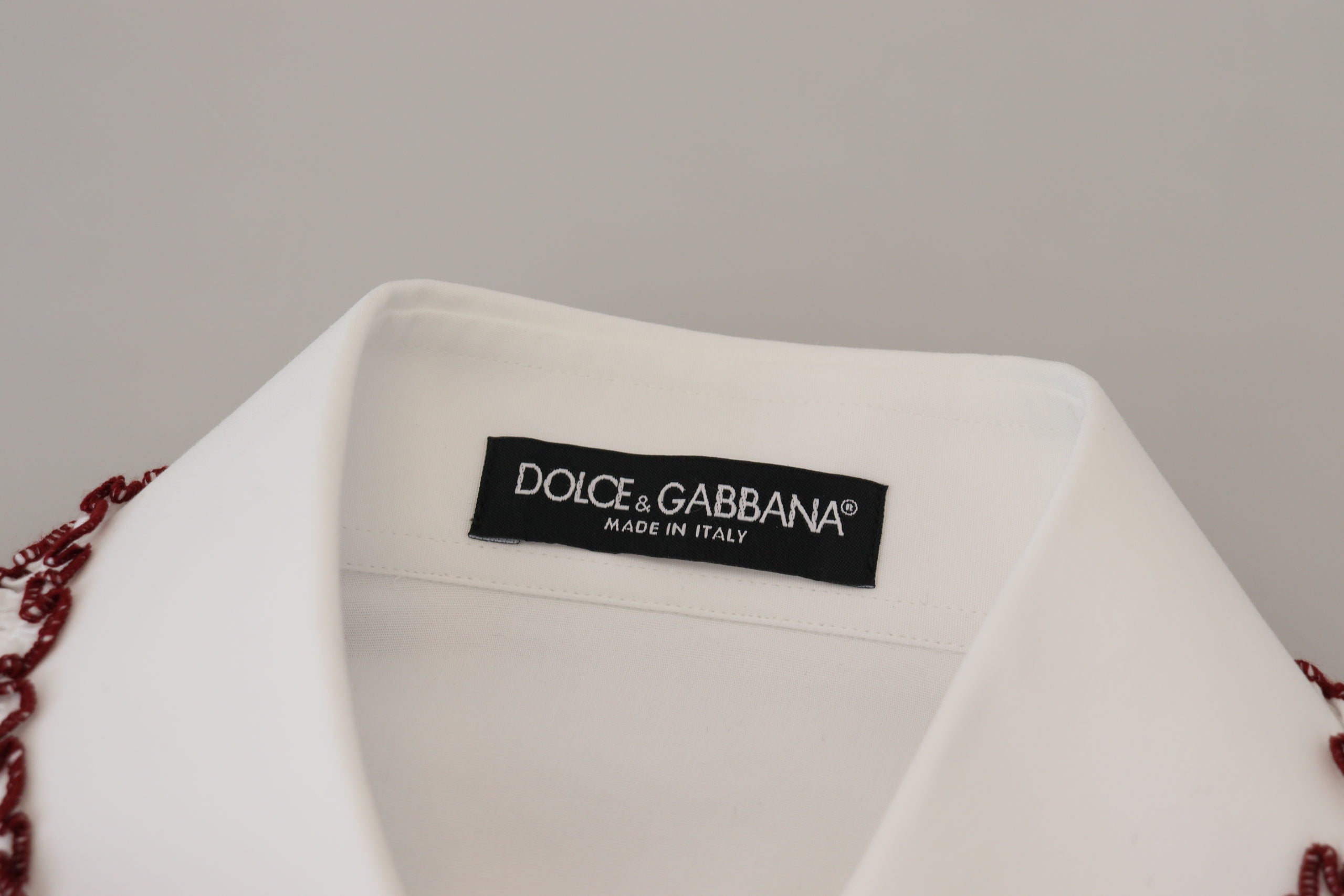 Dolce & Gabbana Weißes Spitzen-Top mit langen Ärmeln und Rüschenkragen