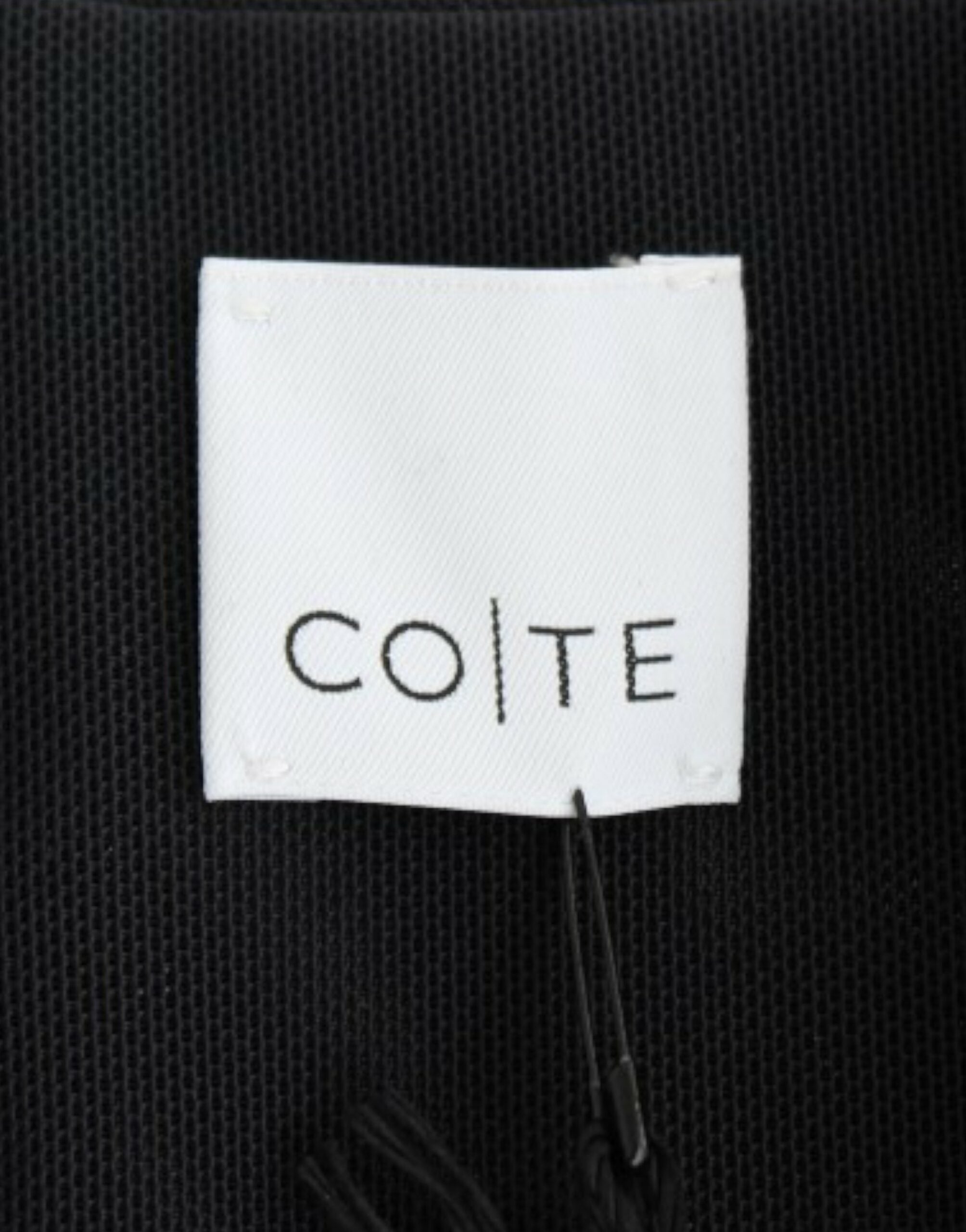 CO|TE Black short sleeve Venus dress