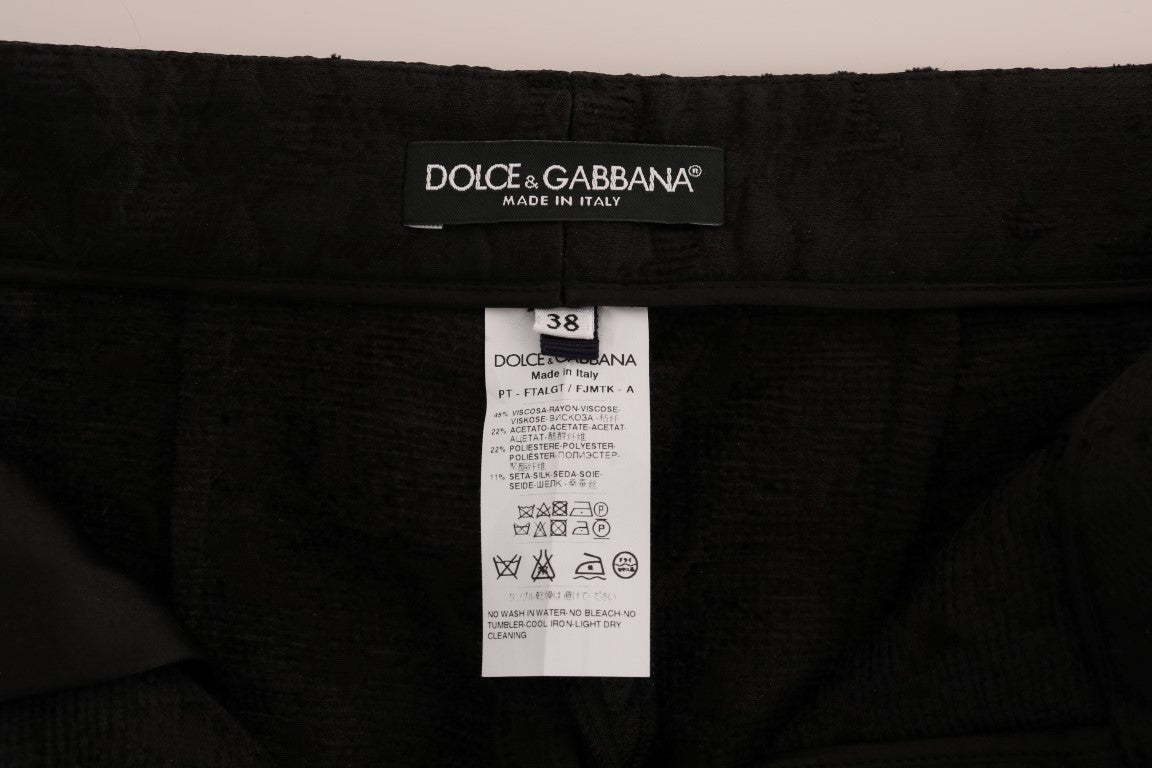 Dolce & Gabbana Schwarze Caprihose aus Brokat mit Blumenmuster